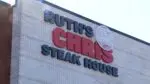 The outdoor sign at Ruth's Chris Steak House at Block 59 in Naperville shines in the sun.