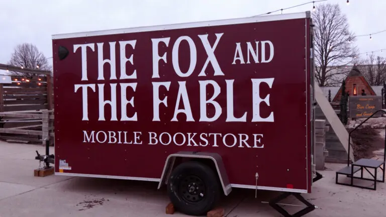 Exterior shot of a cargo trailer repurposed to be a mobile bookstore