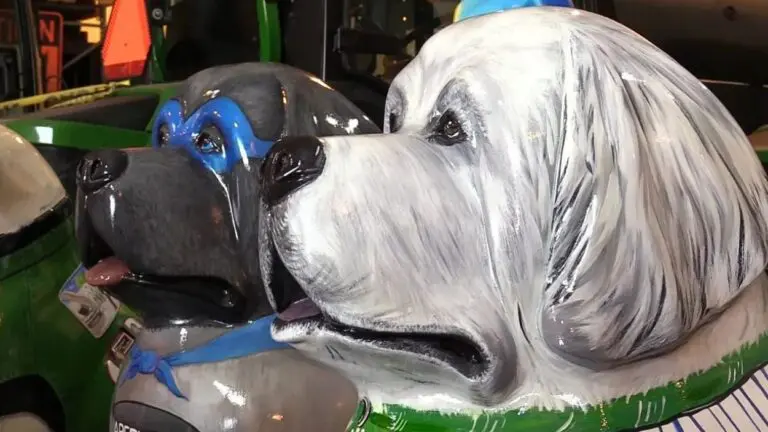 Two painted dog sculptures from Downtown Naperville 2019 sculpture series