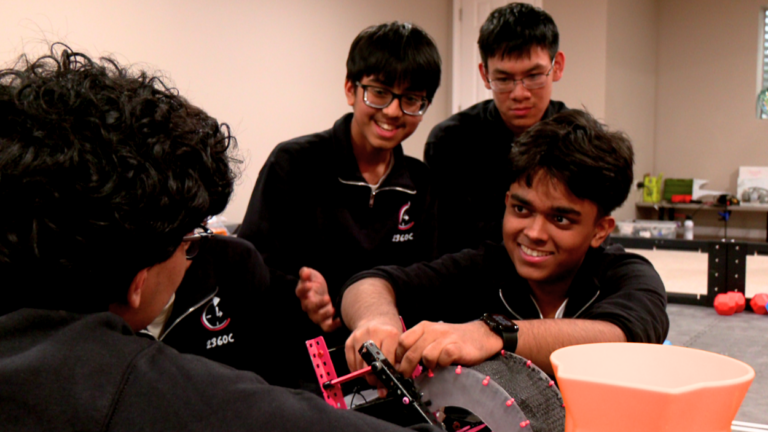 Team 2360C Clockwork works on their robot