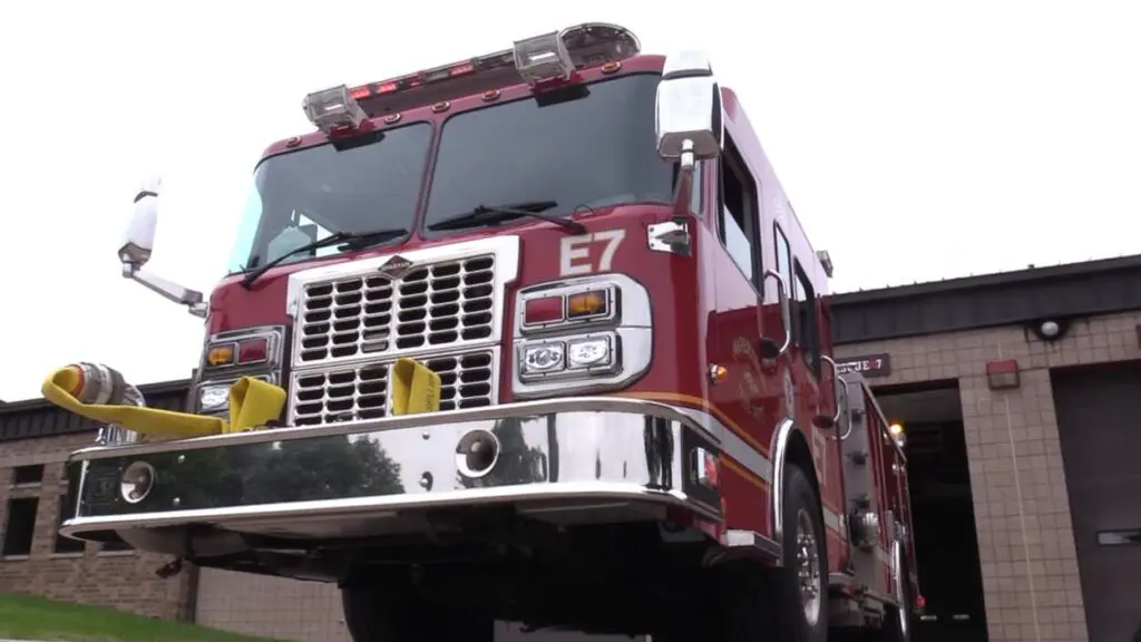 Naperville fire truck low angle looking up at front for story on attic fire