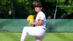 Benet baseball senior Gio Calandriello winds up in win over Downers Grove South.