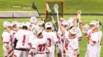 Benet boys lacrosse huddle up in big win.