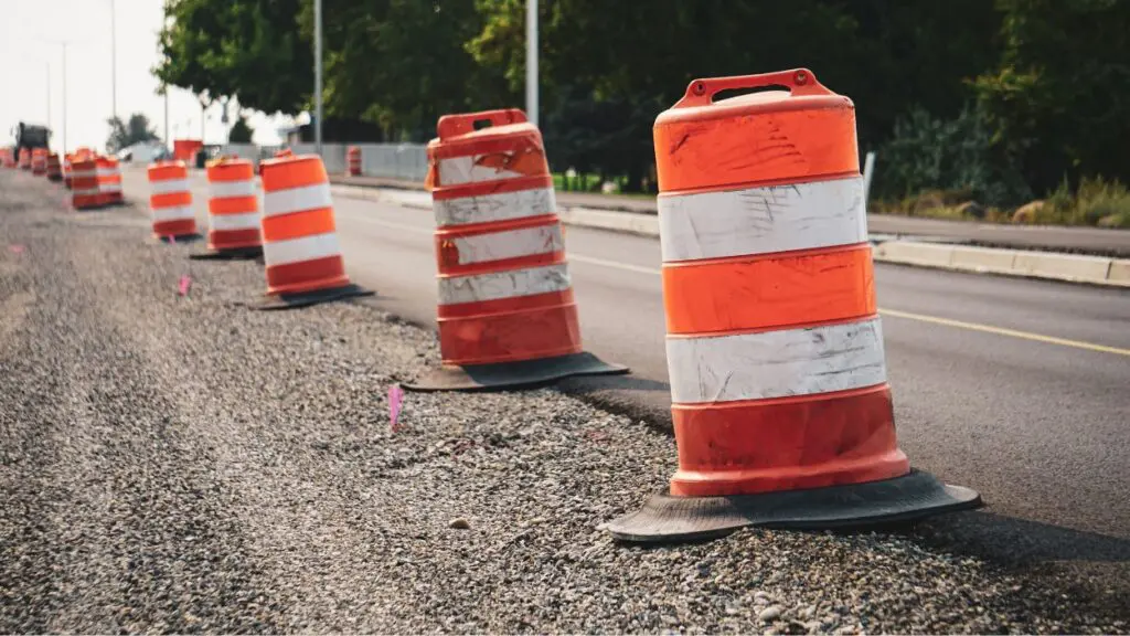 Road construction barrels on road