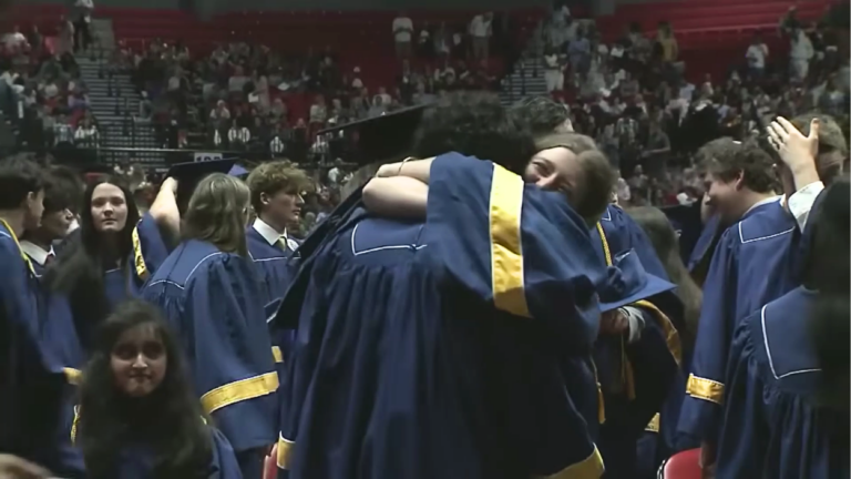 IPSD 204 students hug at graduation
