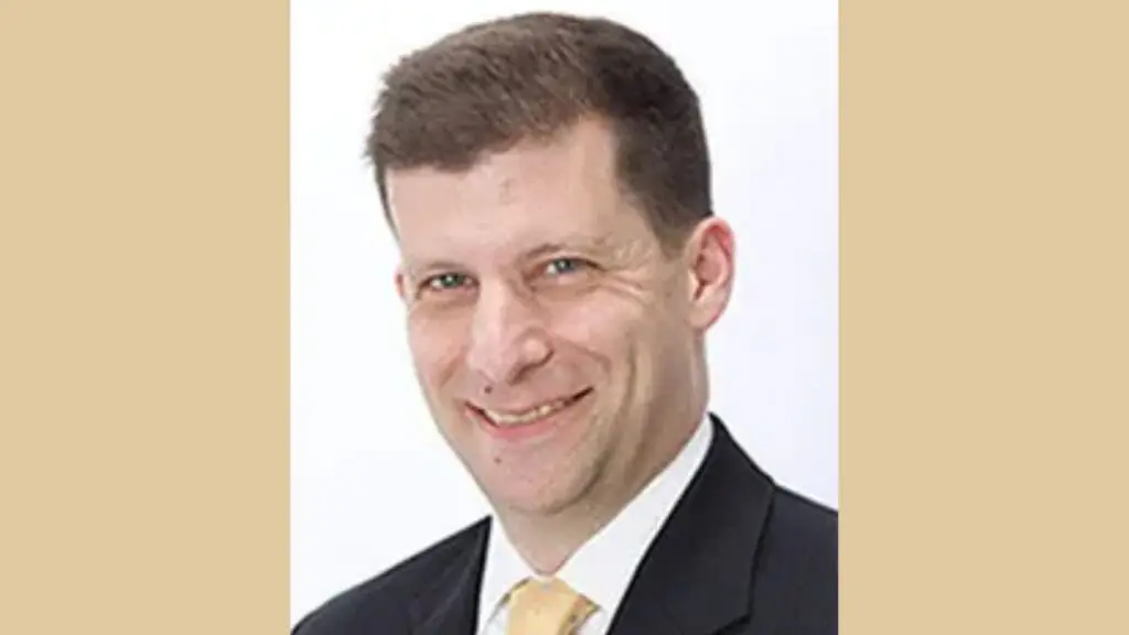 Headshot of Justin Karubas courtesy of IPSD 204