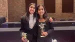 Astha and Reva Savalia pose with trophies from Civics Bee.