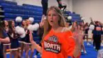 A girl at Naperville North High School gesture while singing along during the filming of the school's lip dub.