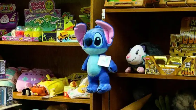 A stuffed toy of Stitch from Lilo and Stitch hangs on a shelf in Anderson's Toyshop in Naperville.
