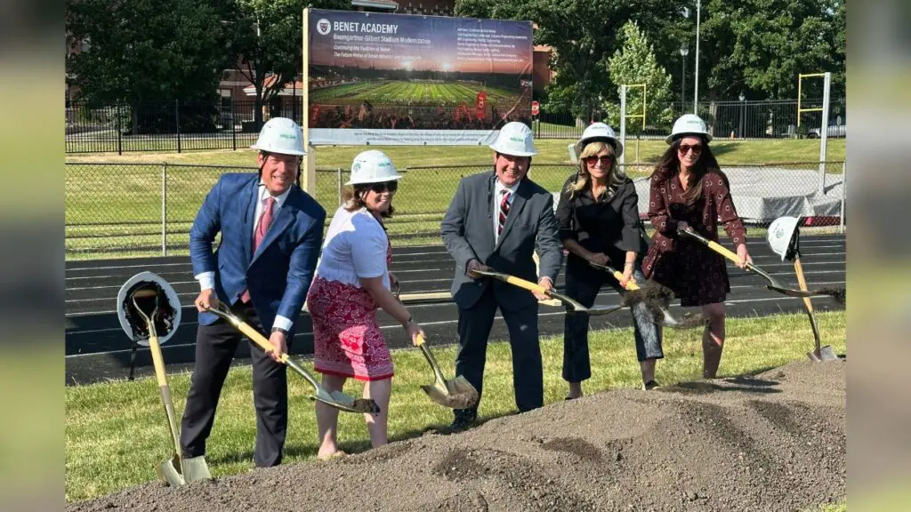 Groundbreaking for Benet stadium project with officials holding shovels