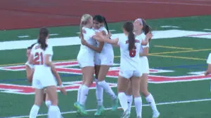 Benet's Sahana Raju and Ashley Polanco team up for a big goal against Oswego.