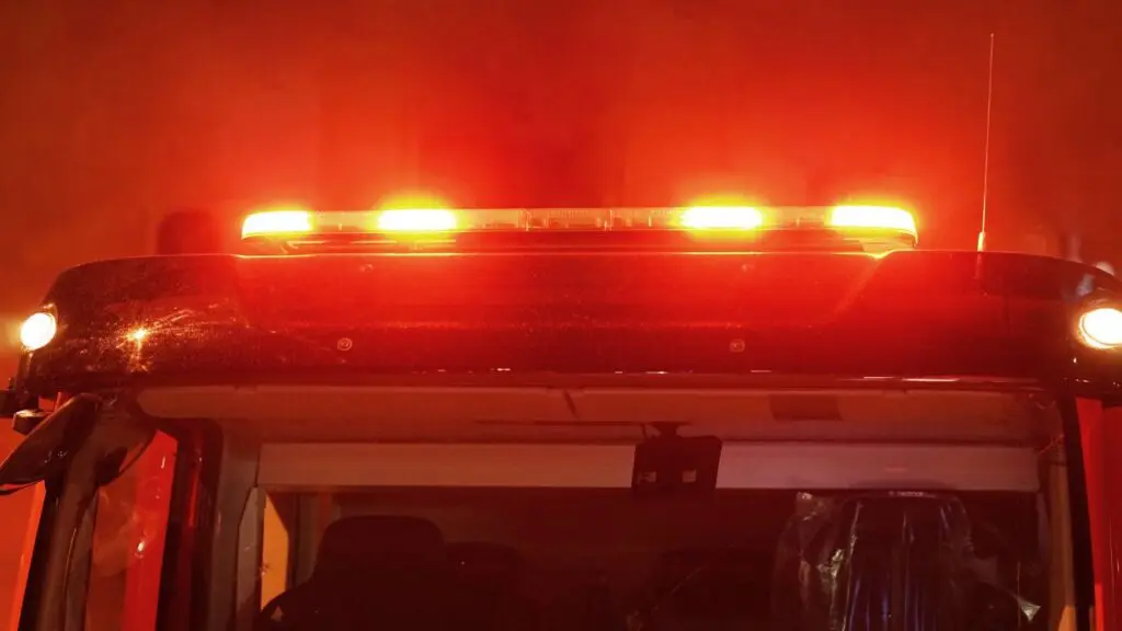 Close up of red lights on fire truck for story on Naperville house fire
