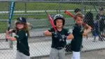 Three Bomb Eagles pose for a picture before their game.