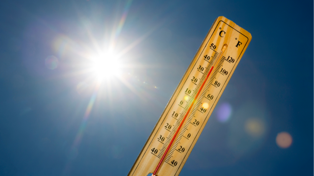 high temps on thermometer with sun in background