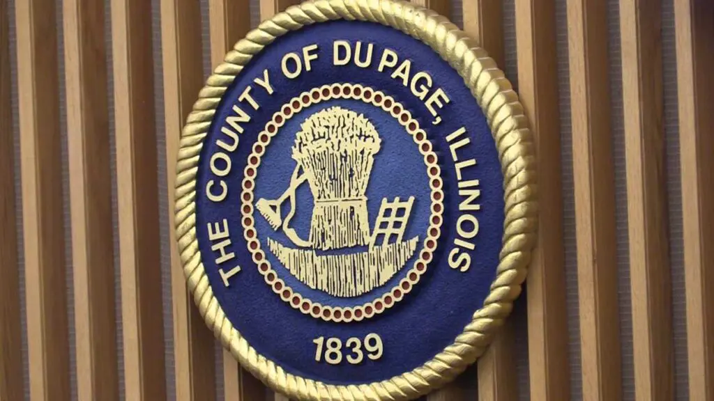 Close up of DuPage County seal mounted on wall