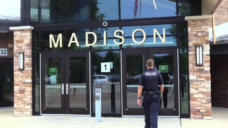 School resource officer walking into Madison Junior High