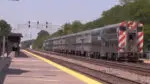The Metra train seen driving by the downtown Naperville station