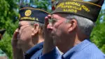veterans from the Judd Kendall VFW saluting