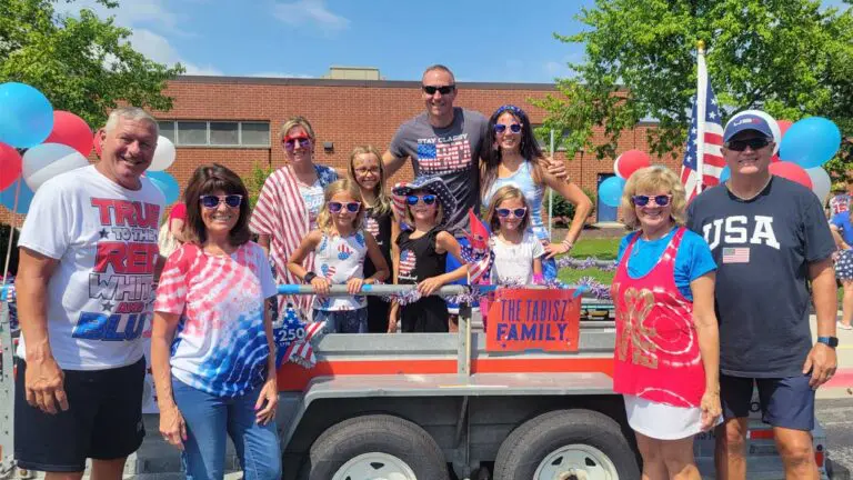 A Brookdale family poses on their Fourth of July Parade float.