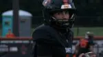 Cruz Herrera of St. Charles East stares before game.