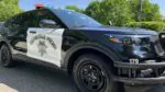 Side, low angle view of Naperville police squad car