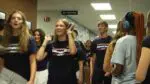 Naperville North seniors walk through halls cheering