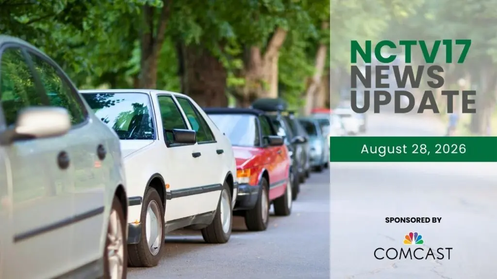 NCTV17 News Update slate for August 28, 2026 with row of parked cars along street in the background