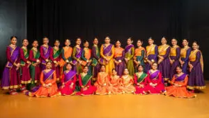 A performance group poses for a picture at HRIDUM 2026