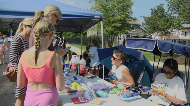 young entrepreneurs sell merchandise at the first ever young innovators market in Naperville