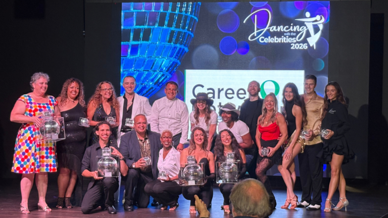 competitors at Dancing with the Celebrities pose with their trophies