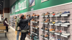customers look at L.L.Bean boots at Naperville store