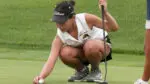 Gigi Sereenen for Metea sets up her putt