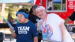 Vendors smile for a photo at the All Abilities Vendor Fair in Naperville