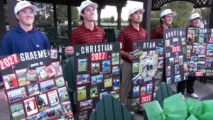 Naperville Central boys golf with senior night posters