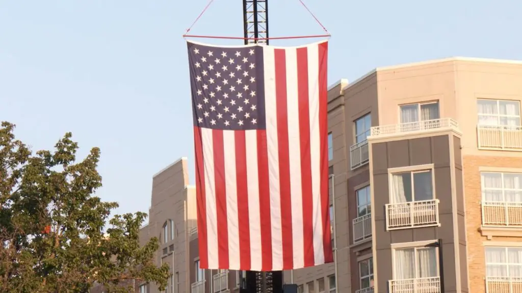 Close up of American flag hanging on crane for Naperville Sept. 11 remembrance ceremony