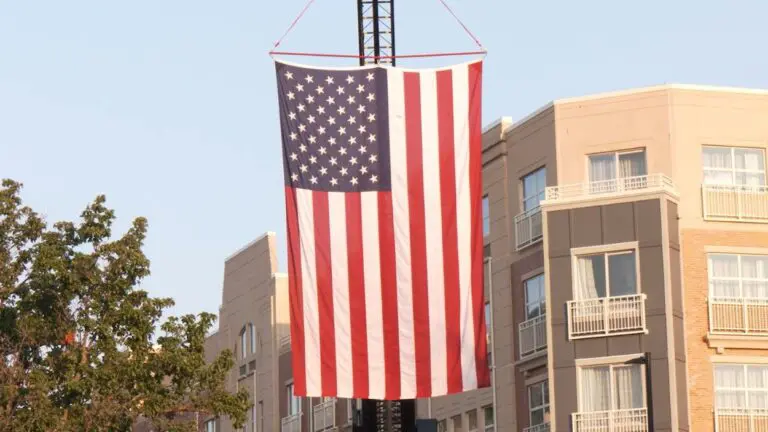 Close up of American flag hanging on crane for Naperville Sept. 11 remembrance ceremony