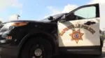 Close up side of Naperville police car with door open