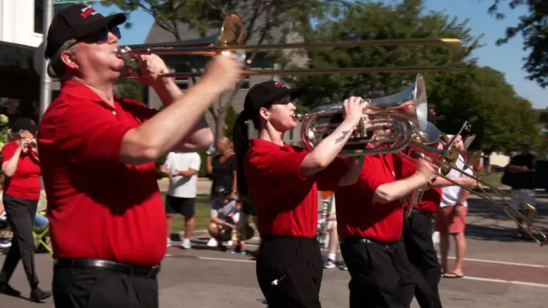 Members of the Naperville Municipal Band play in the Naperville Jaycees Labor Day Parade 2026.
