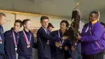 Neuqua boys cross country gets ready to celebrate state title.