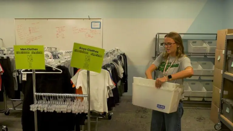 packing a donation box at the Kid Booster Resource Center
