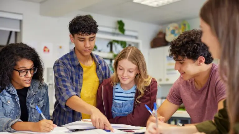 A group of students work together on an assignment