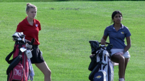 A Central and Neuqua golfer stare on the course.
