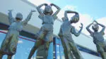 The statue outside the Fry Family YMCA in Naperville of four children, each one performing each letter of "YMCA"