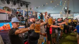 A group of men compete in the stein-holding competition at Naper Settlement's Oktoberfest celebration. Courtesy: Naper Settlement