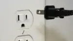 Close up of plug and outlet