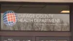 DuPage County Health Department sign on glass