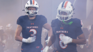 Oswego football takes the field for the playoffs