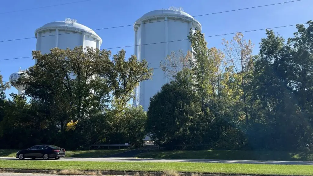 2 white towers on land where proposed Naperville Ridge would have been developed