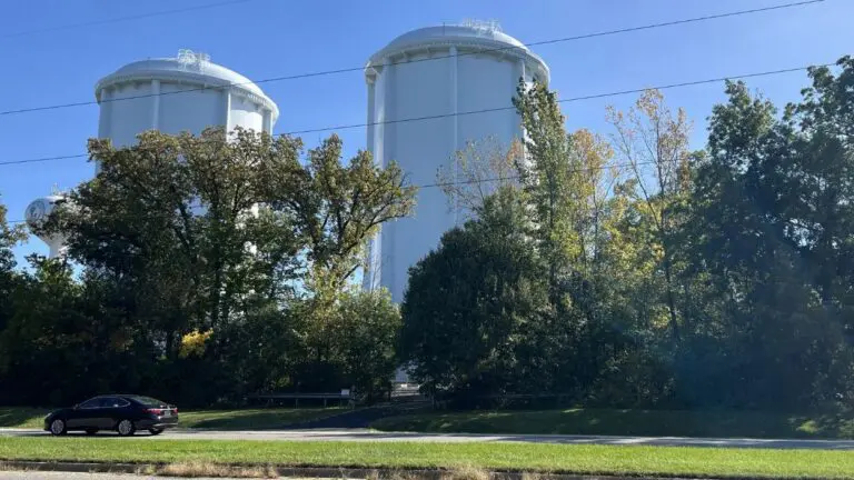 2 white towers on land where proposed Naperville Ridge would have been developed