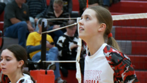 Katelyn Kritzer stares as a ball is hit to her in warmups.